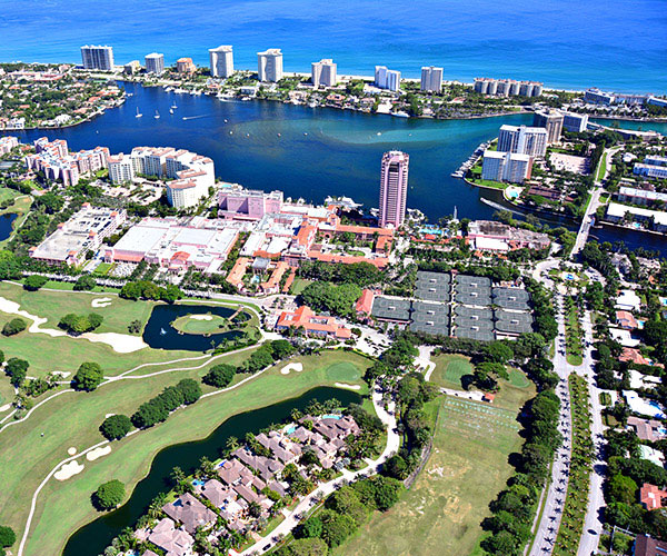 boca raton florida It all began with a man and a vision. Addison Mizner, the founding father of Boca Raton, envisioned a fantasyland where the rich and famous could escape. Since then, visitors around the globe have come to regard Boca Raton as one of the prime vacation destinations in the world, a place where palm trees sway in the breeze, vibrant hibiscus and honeybell oranges bloom, and the water is turquoise-clear. Boca Raton has stunning Atlantic beaches, beautiful landscapes and charming architectural designs.